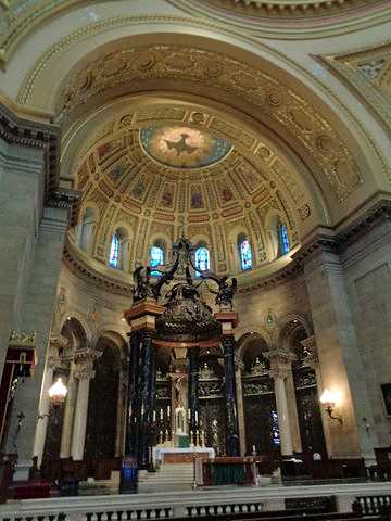 Color image of the altar and baldachin (decorative canopy) inside the St. Paul Cathedral. Photographed by Paul Nelson on July 10, 2014.