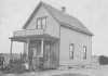 Black and white photograph of the Crispus Attucks Orphanage and Old Folks Home at its original location on East Acker Street in St. Paul, c.1905.