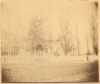 Black and white photograph of three individuals standing in front of Singer's Hall, Young America, 1870s or 1880s.