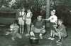 Black and white photograph of campers cooking outdoors at Dick Butwin Day Camp, 1967.