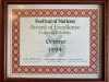 Award presented to the designers of a Oromo cultural exhibit at the Festival of Nations