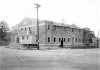 Black and white photograph of the exterior of Deerwood Auditorium exterior under construction, c.1936.