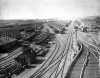 Black and white photograph of the large classification yard and part of the shops complex at Proctor, 1900. 