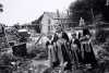 Black and white photograph of Hmong women in traditional costume, Frogtown, 1993. Photograph by Wing Young Huie.