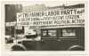 A Farmer-Labor political poster atop an automobile, ca. 1925.