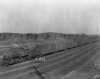 Black and white photograph of a Minneapolis, Northfield and Southern Railway freight train, 1929.