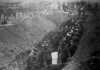 Black and white photograph of Minnesota Home Guardsmen burying dead of the Fires of 1918.