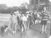 Group of children being escorted by School Police.