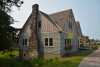 Color image of Stickney Inn and Store, east elevation, facing southwest, July 2014. Photographed by Amy Lucas.