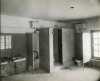 Black and white photograph of a the mail carrier’s (men’s) toilet inside the Anoka Post Office, January 11, 1917. 