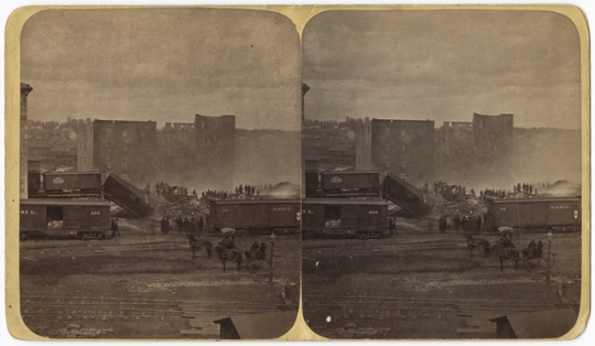 Black and white photograph of the ruins of the Pettit, Zenith, and Galaxy Mills after Washburn A Mill explosion on the Mississippi Riverfront, 1878.