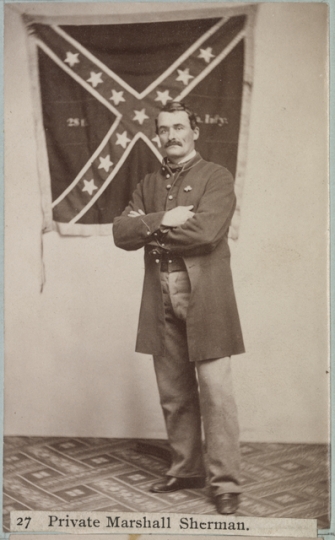 Marshall Sherman standing with the Twenty-eighth Virginia battle flag