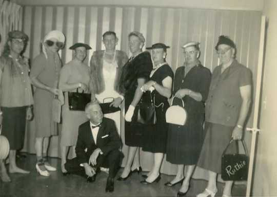 Black and white photograph of a Farm Bureau men in fashion show, 1962. 