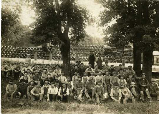 Photograph of a group of factory employees