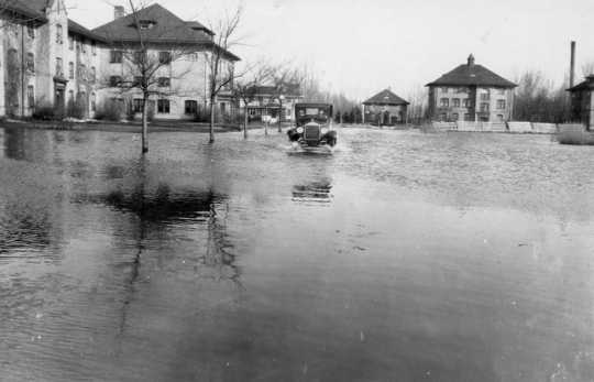 Black and white photograph of the flooded NWSA campus during the 1920s. 