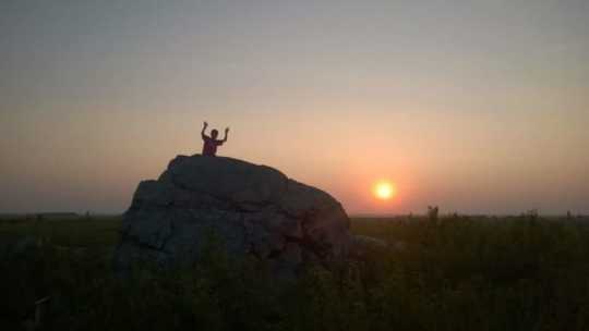 Color image of the Eagle Rock at sunset, 2014. From the photograph collection of the Minnesota Department of Natural Resources. 