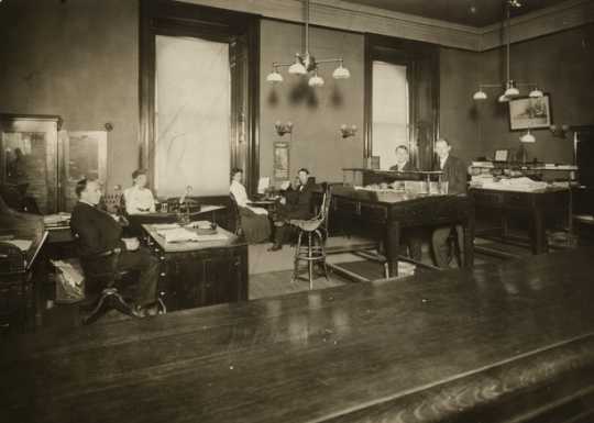 Black and white photograph of the Railroad and Warehouse Commission office in the second state capitol, ca. 1903.