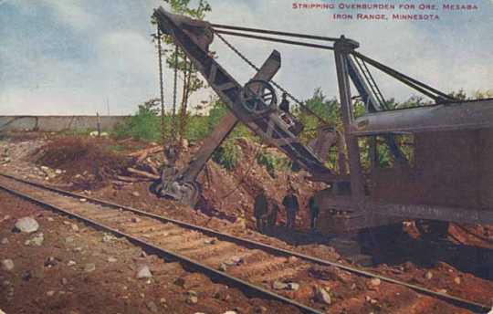 Color postcard depicting machinery at work stripping overburden for ore on the Mesabi Iron Range c.1905.