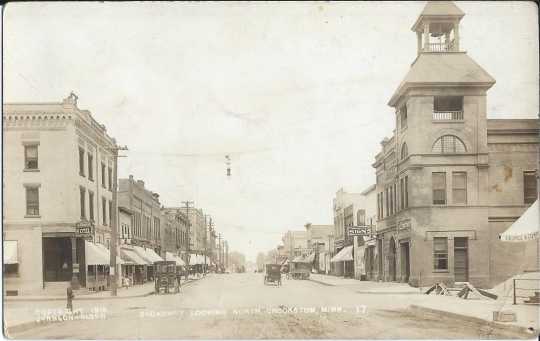 Black and white photograph of City hall at the corner of Broadway and Fletcher Streets, Crookston, 1914.