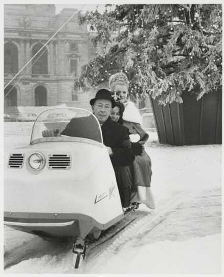 Governor Karl Rolvaag with St. Paul Winter Carnival Queen of the Snows Jean Williams and Minneapolis Aquatennial Queen of the Lakes Karen Erlandson, riding a Polaris Colt on the grounds of the Minnesota State Capitol, 1967. From box 3 of the Karl F. Rolvaag papers (Government Records Collection, Minnesota Historical Society, St. Paul).