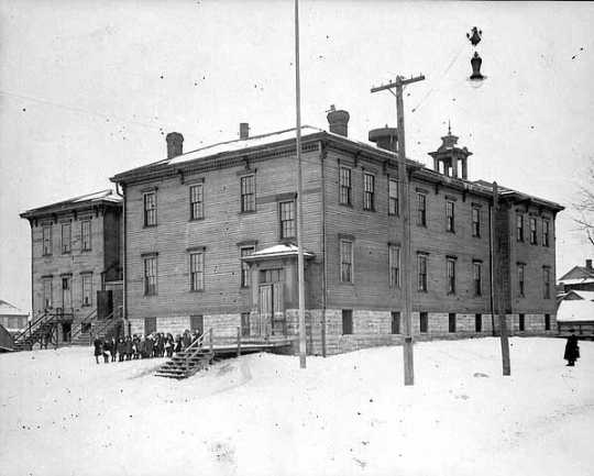 Black and white photograph of Lafayette School, corner of Kentucky and Fenton, the only public school in the Flats, c.1921. 