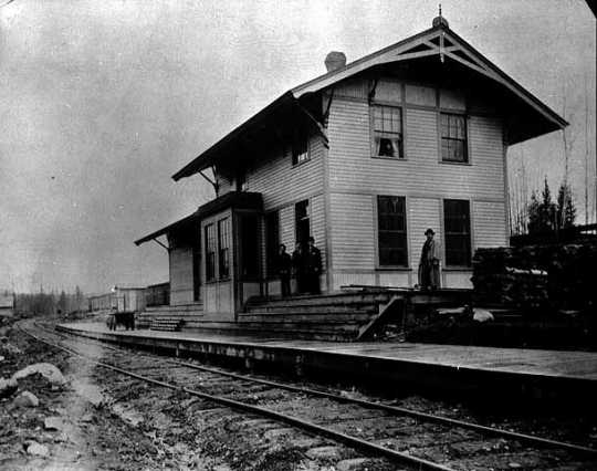 Black and white photograph of the first train depot, built by the Merritts at Mountain Iron, 1893.