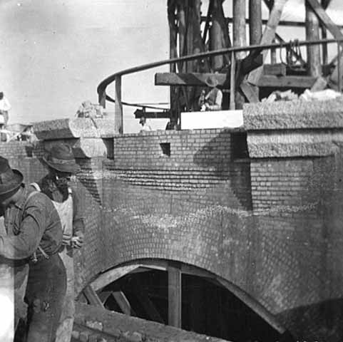 Men working on the base of the capitol dome