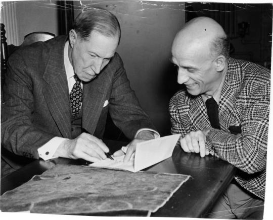 Dimitri Mitropoulos signing a contract with the Minneapolis Symphony Orchestra