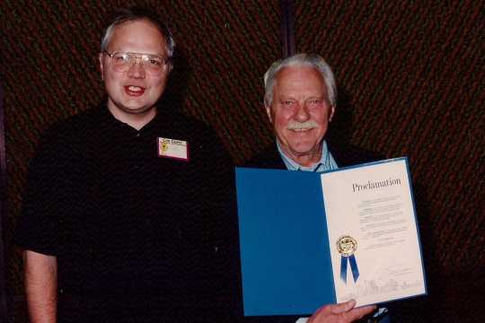 Color photograph of MN Cartooning Historian David Mruz with Curt Swan, October 2, 1993. 