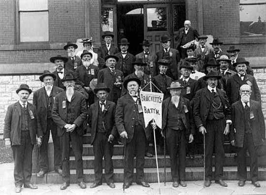 Black and white photograph of Brackett's Battalion veterans gathered for a Grand Army of the Republic Reunion, 1905.