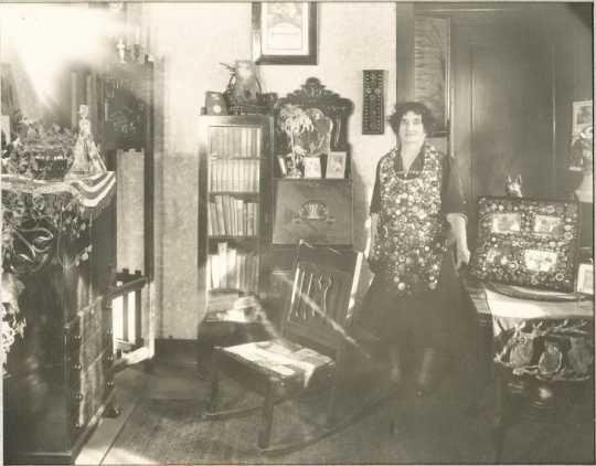 Black and white photograph of Susie Hanson Smith With Button Collection.