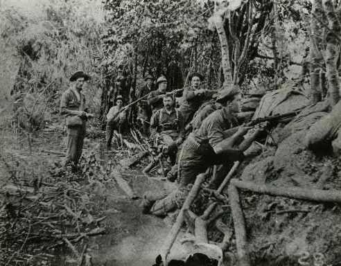 Black and white photograph of Minnesota soldiers on guard around Manila. 