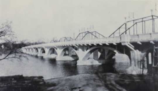 Black and white photograph of the Anoka–Champlin Mississippi River Bridge 4380, ca. 1930. 