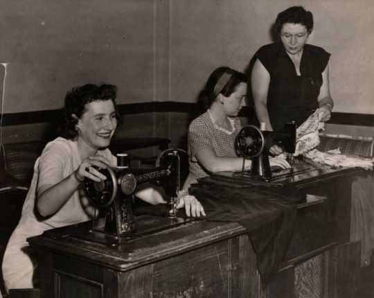 Photograph of a sewing class at the Jewish Educational Center in St. Paul, 1945.